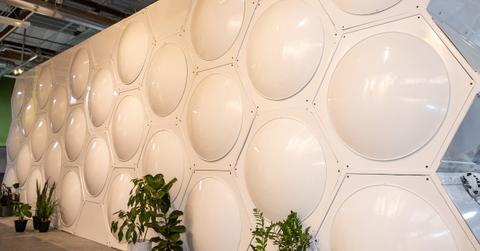 General view of an array of white composting vessels at Recompose at Recompose Seattle on Oct. 6, 2022 in Seattle.