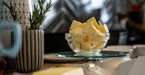 A bowl of cubed butter sits on a counter