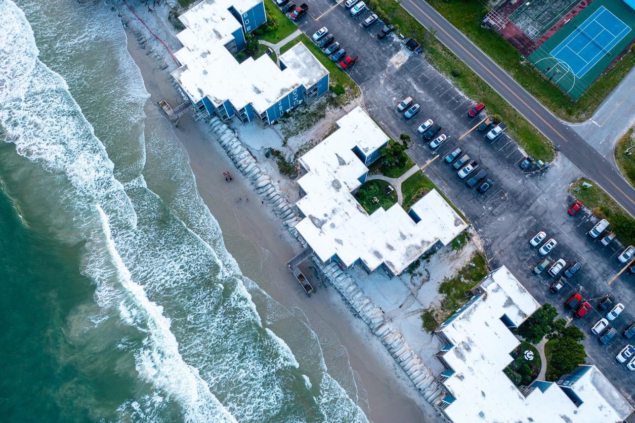 Aerial view of houses on the coast