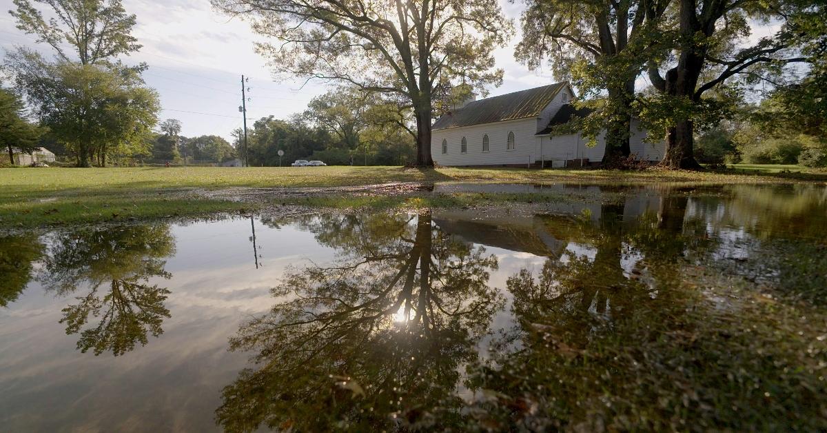 Still from Resita Cox's documentary 'Freedom Hill' showcasing a church on flooded ground in Princeville, N.C.