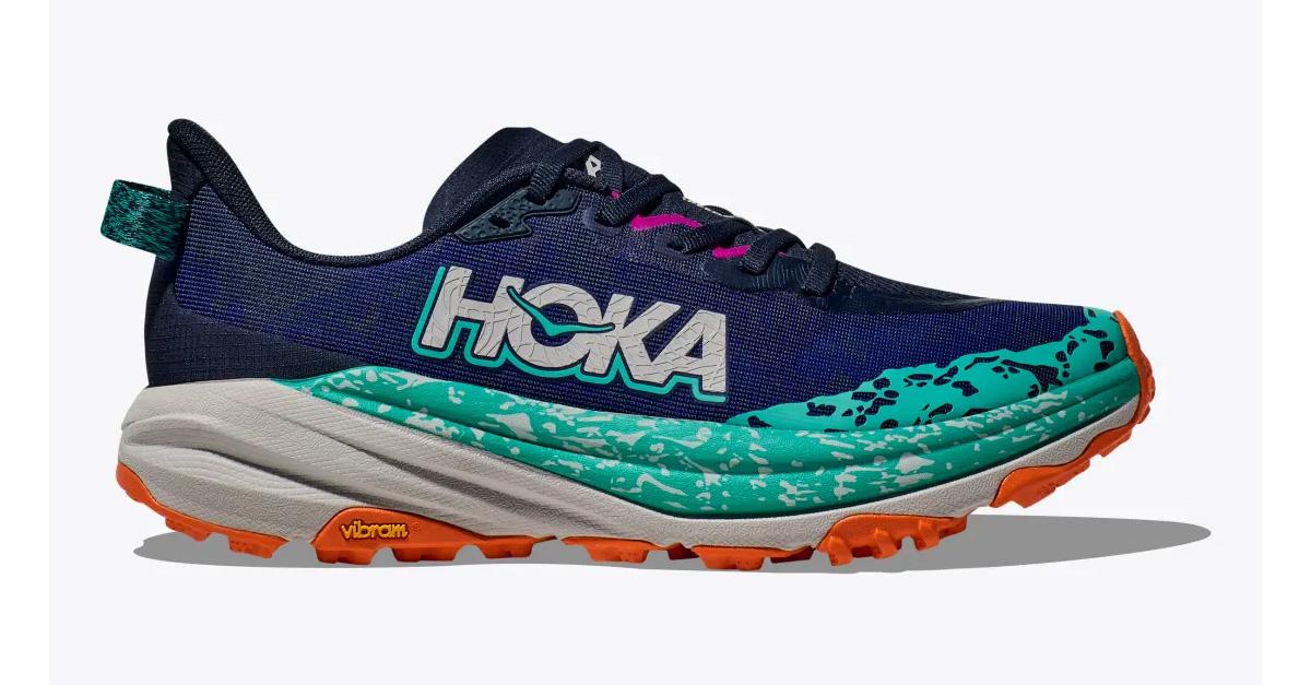 Hoka Speedgoat 6 shoe for women in blue with green, gray, and orange sole