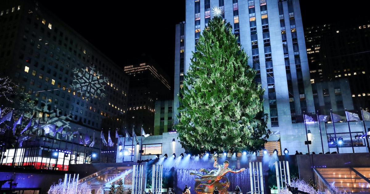 Rockefeller Christmas tree at night, before being decorated, with the iconic fountain seen in front