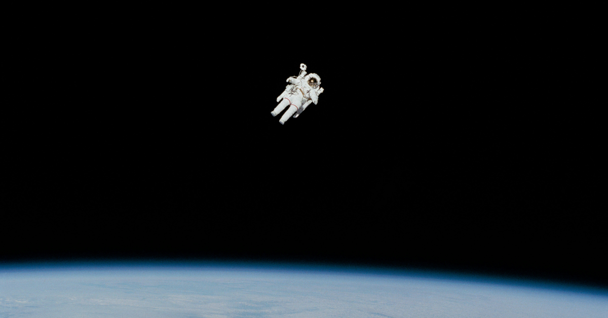 An astronaut floats in space