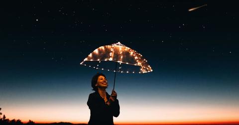 A person watching shooting stars in the night sky. (Representative Cover Image Source: Pexels | Matheus Bertelli)