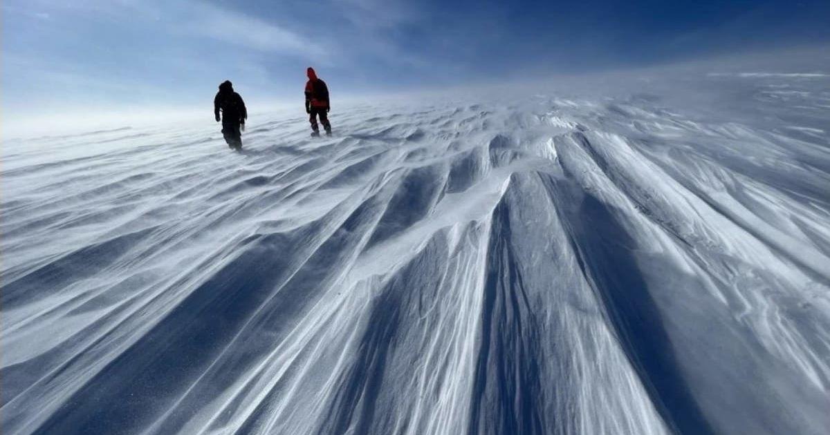 GreenDrill team members at Prudhoe Dome, a key ice cap part of the Greenland Ice Sheet. (Cover Image Source: University at Buffalo | Photo by Jason Briner)