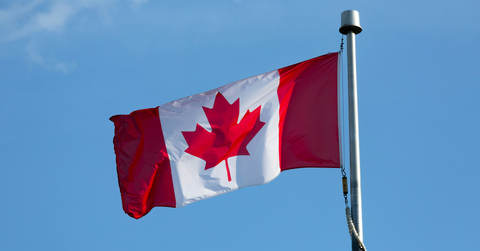 A Canadian flag blows in the wind