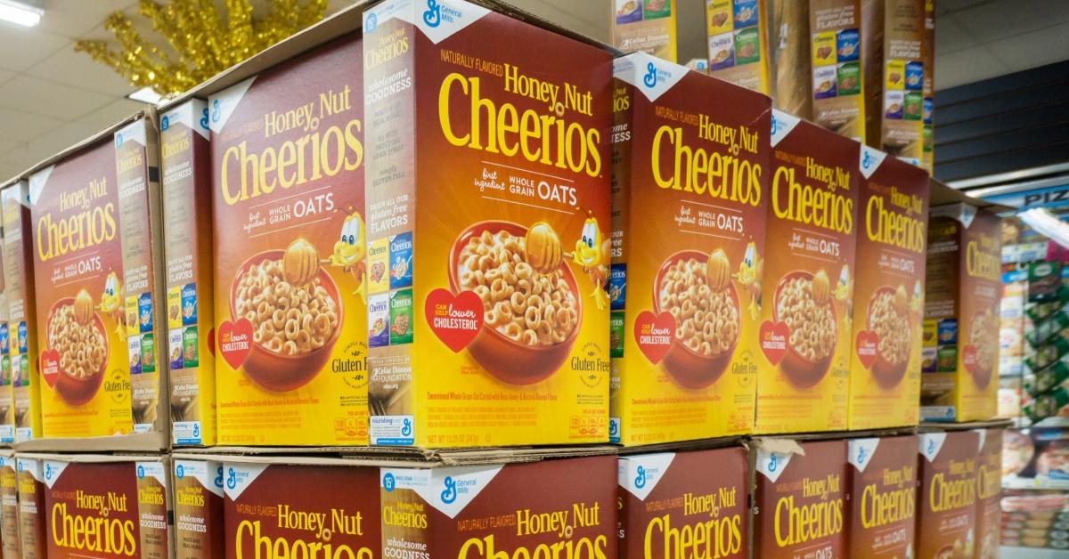 A display of stacked Honey Nut Cheerios boxes at the store. 