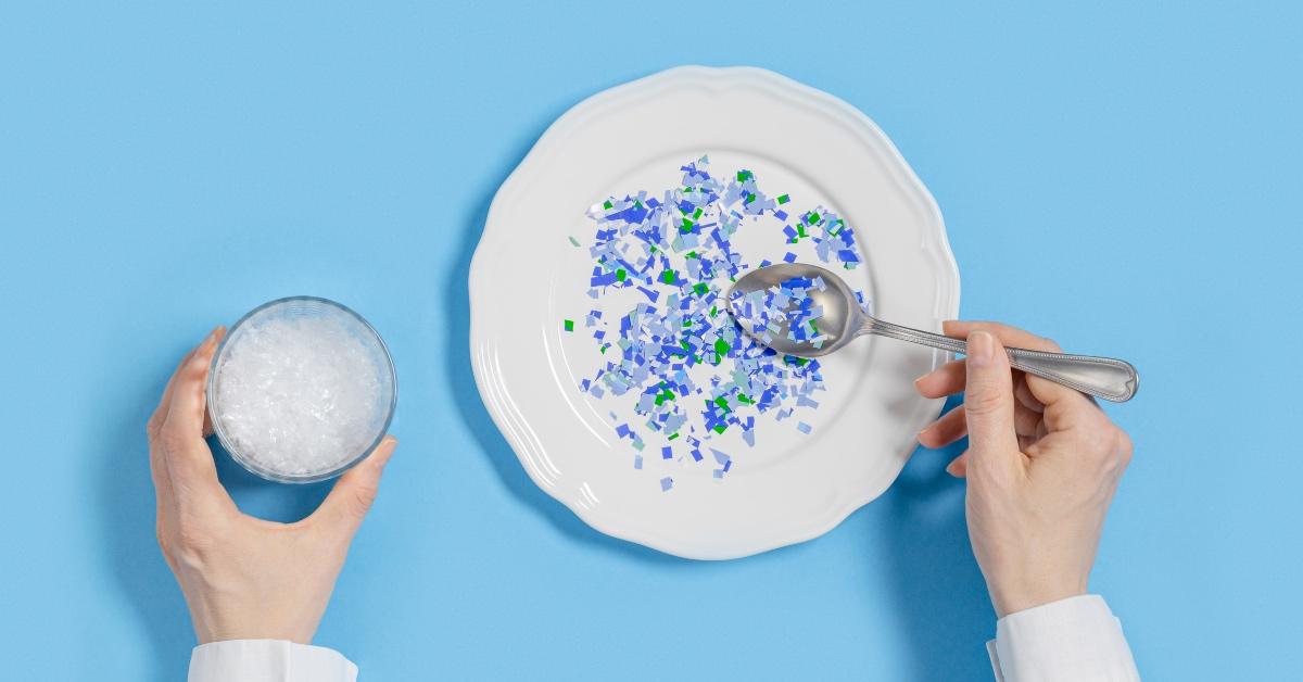 A person with a plate full of microplastics. 