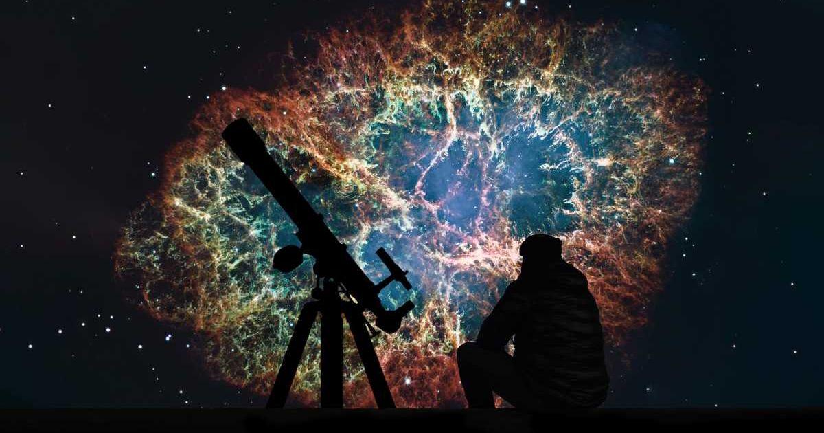Man with telescope looking at the stars. (Representative Cover Image Source: Getty Images | Allexxandar)