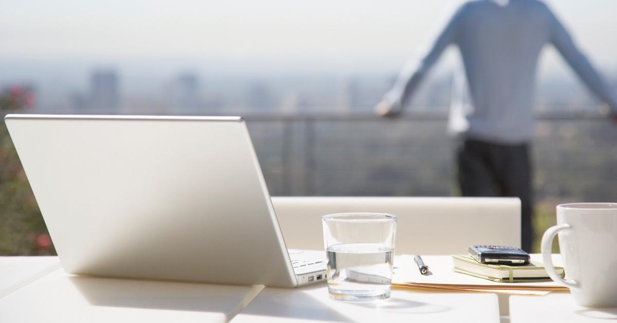 Person doing remote work from their balcony.
