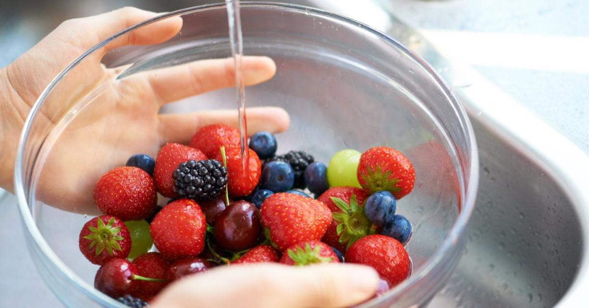 Washing fruits.