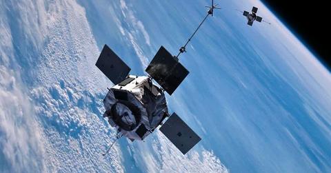 Illustration of NASA's twin Van Allen Probes orbiting Earth. (Cover Image source: JHU/APL, NASA)