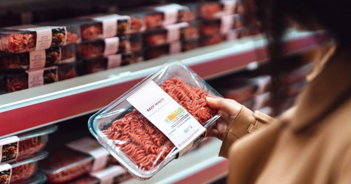 Woman holding a pack of ground beef (Representative Cover Image Source: Getty Images | Oscar Wong)