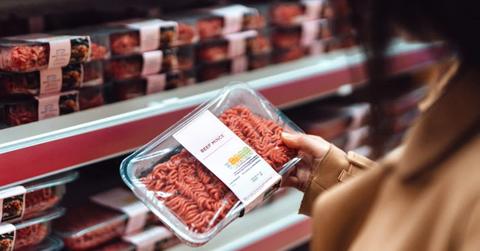 Woman holding a pack of ground beef (Representative Cover Image Source: Getty Images | Oscar Wong)