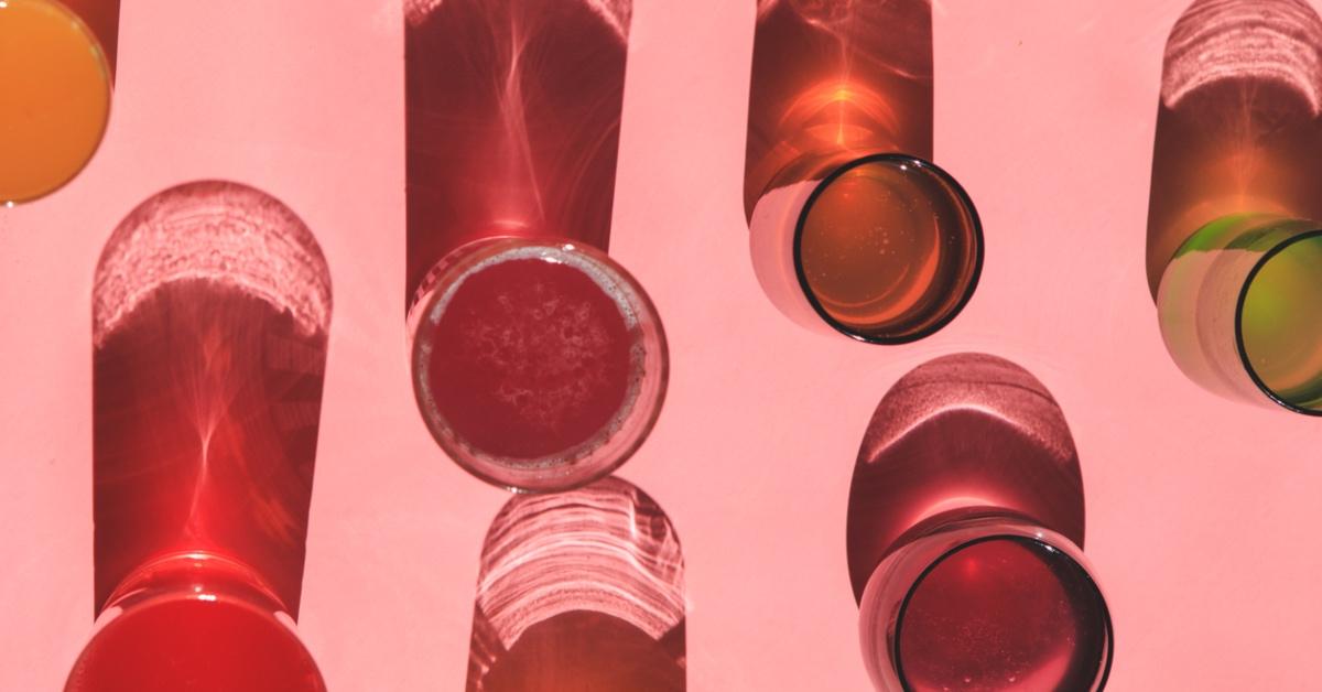 Photos of red kombucha in glasses. 