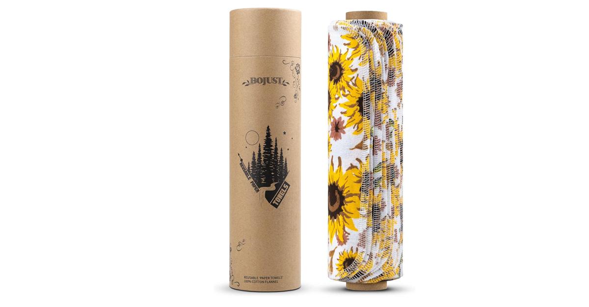 Reusable paper towels with a sunflower print on a white background.