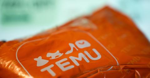 An orange plastic Temu packatge with the Temu logo of the app.