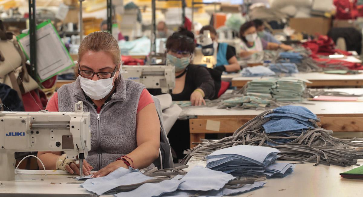 American factory workers sewing