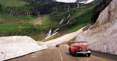 Car driving down Going-to-the-Sun Road in Glacier National Park. (Cover Image Source: Getty Images | Gunter Marx Photography)