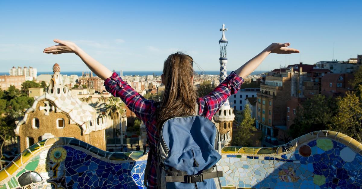 Woman backpacking alone while traveling for a gap year