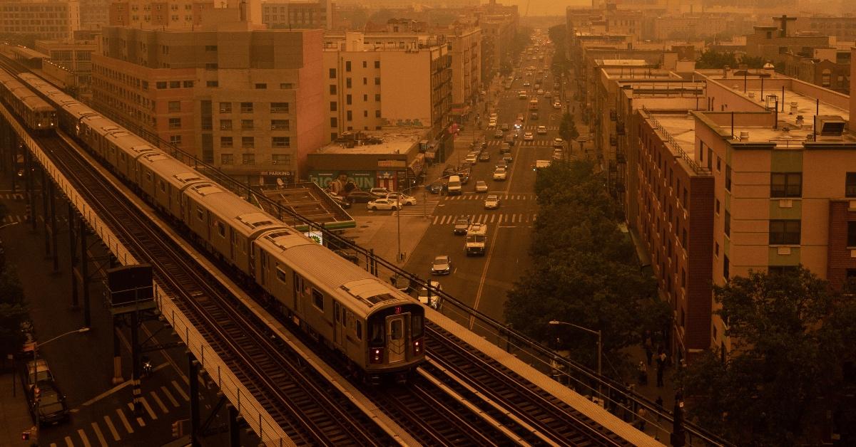 Photo of a MetroNorth train line entering Grand Central Station from the Harlem 125th street stop.