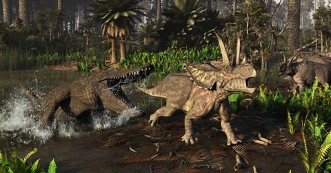 Illustration of a Deinosuchus alligator attacking an Agujaceratops dinosaur (Representative Cover Image Source: Getty Images | Arthur Dorety/Stocktrek Images)
