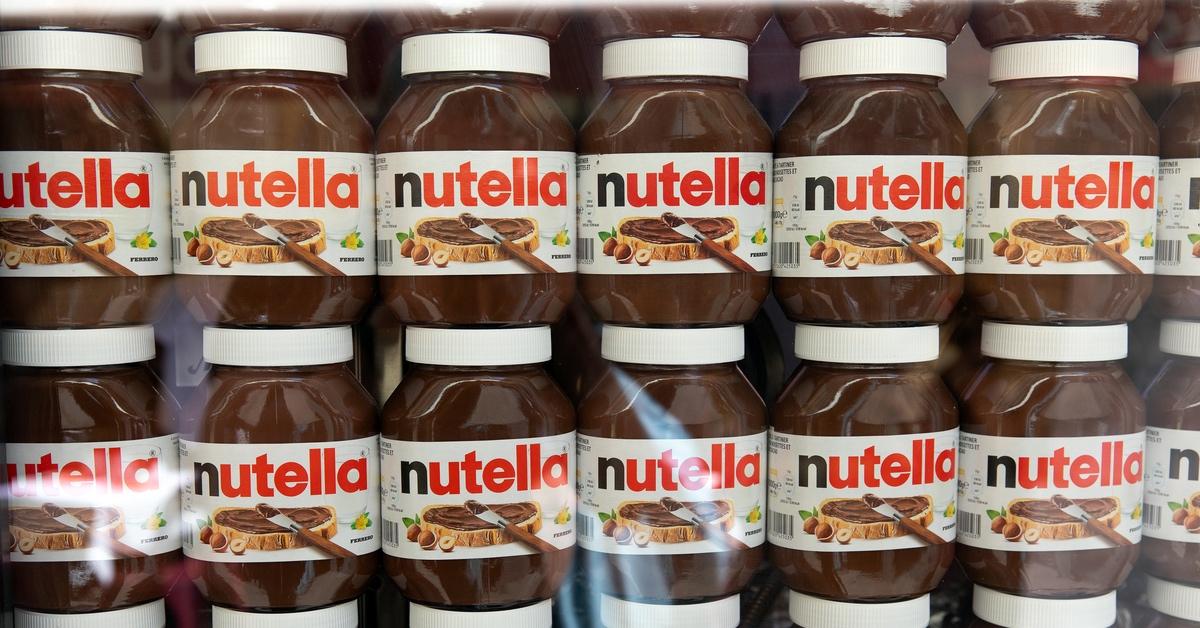 Nutella chocolate hazelnut spread on shelves in a grocery store. 