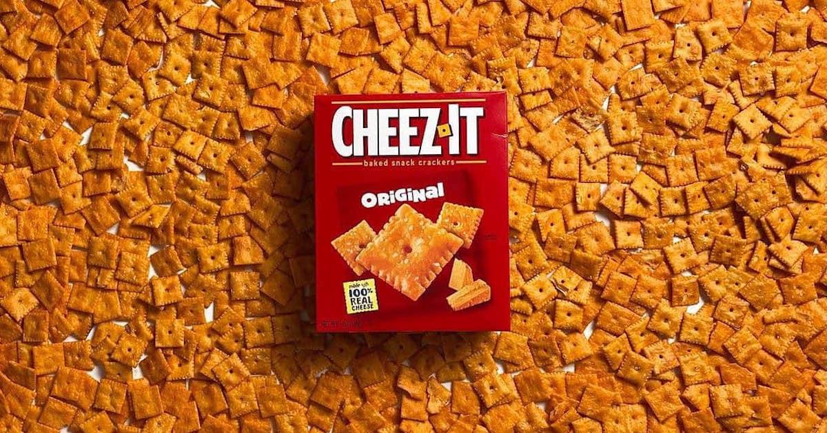 Photo of an original Cheez-It box surrounded by a sea of Cheez-It crackers