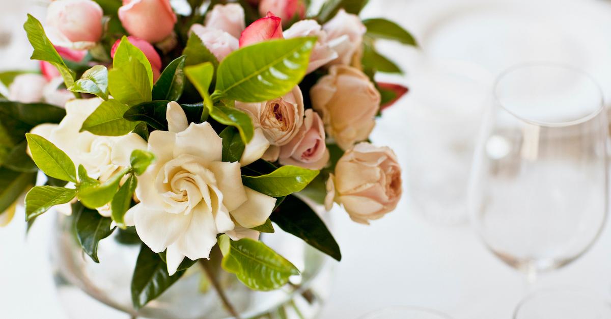 Bouquet of white and pink flowers on a table.