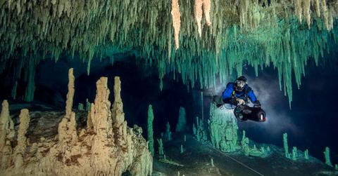 Innards of a beautiful cavern brimming with stalactites and stalagmites (Representative Cover Image Source: Getty Images | Westend61)