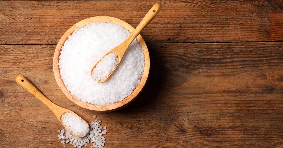 Bowls of sea salt on a table.