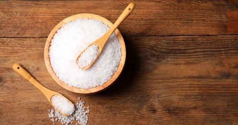 Bowls of sea salt on a table.