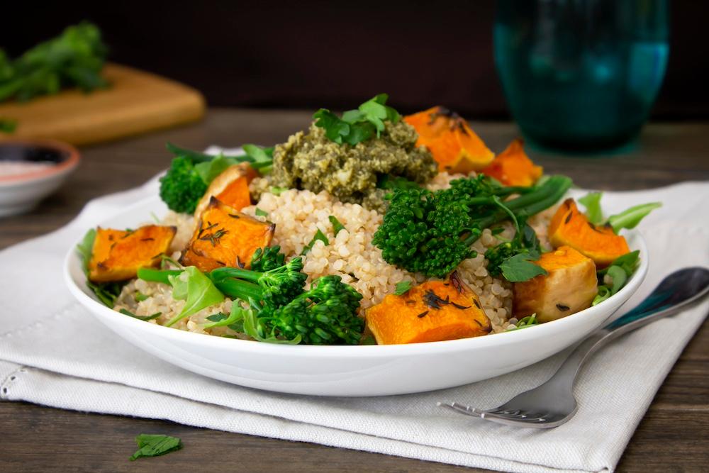 A quinoa bowl with broccoli and butternut squash. 