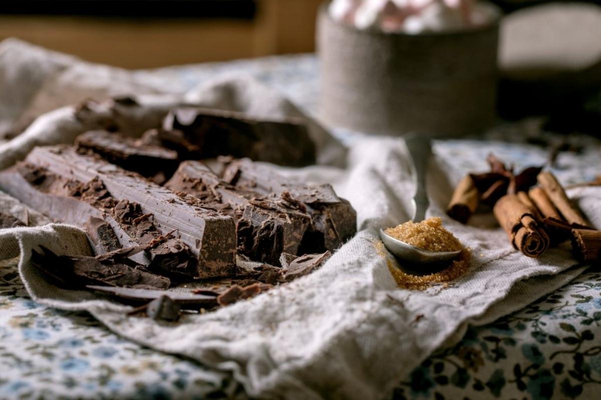 chopped dark chocolate and brown sugar on rustic tablecloth