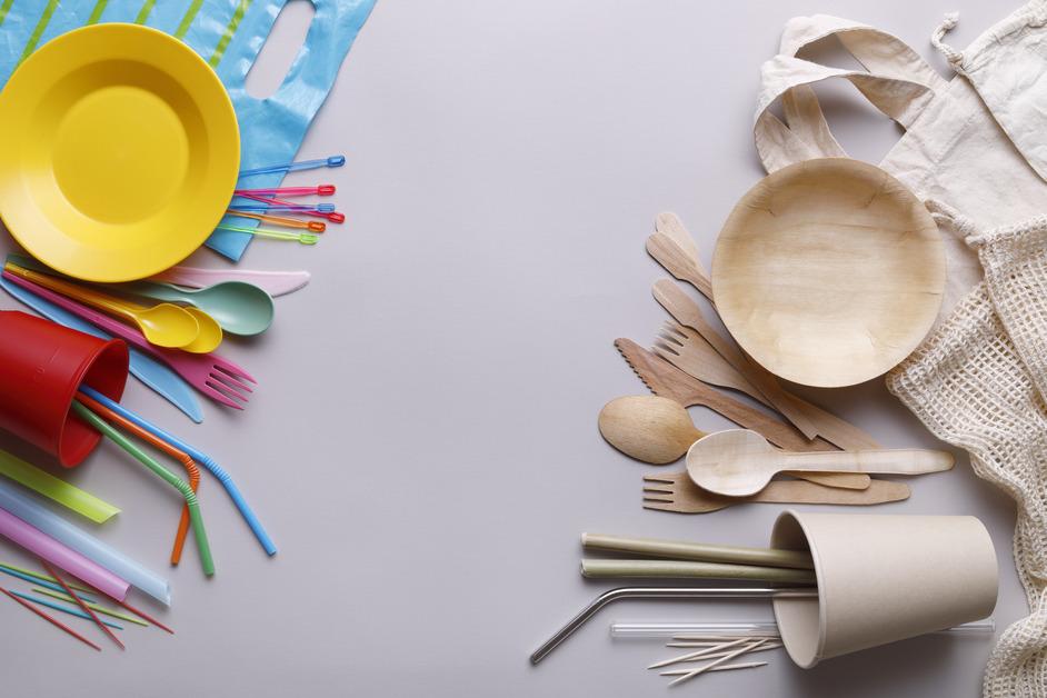 A stock photo of single-use plastics next to alternatives.