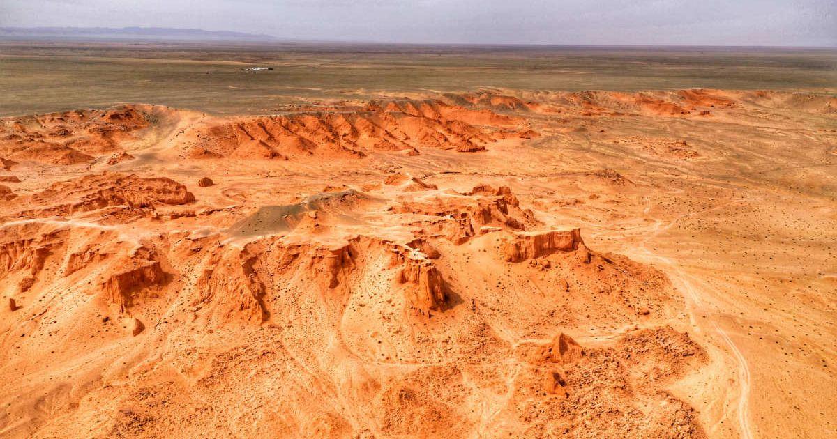 Aerial view of a vast desert area. (Representative Cover Image Source: Pexels | Sungmu Heo)