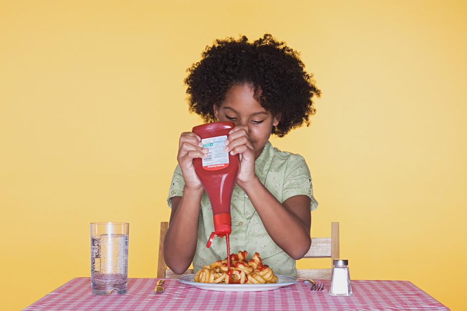 Girl eating fries