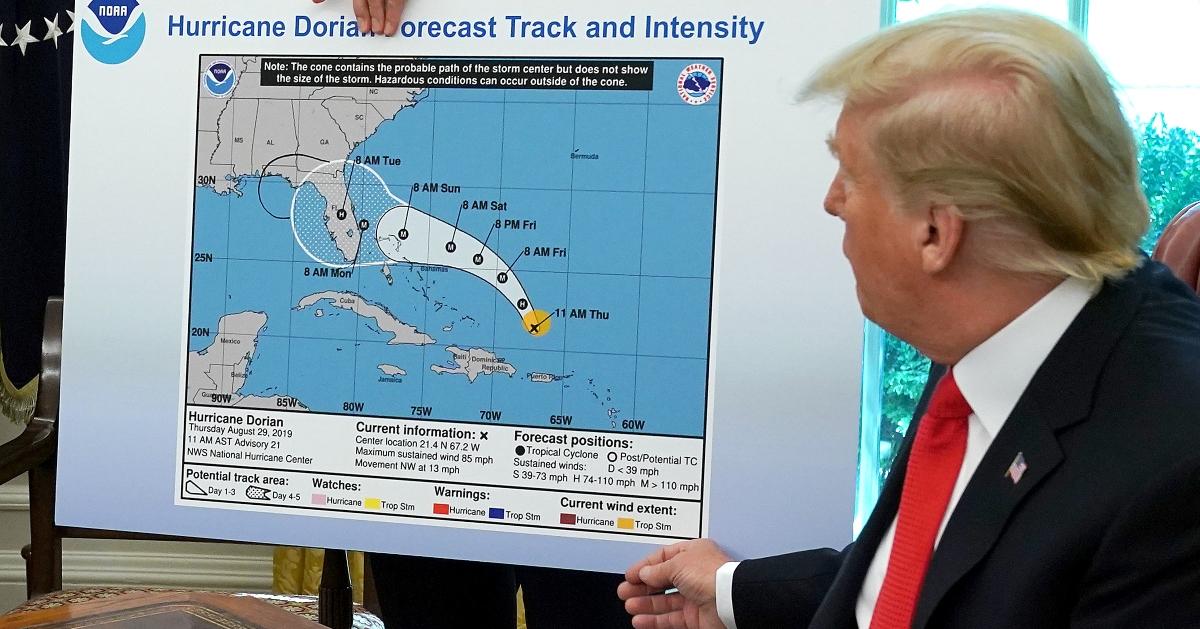 Trump, pictured at the White House with his altered storm path of Hurricane Dorian; the event later became known as “SharpieGate.” 