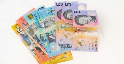 Australian money is fanned out across a table
