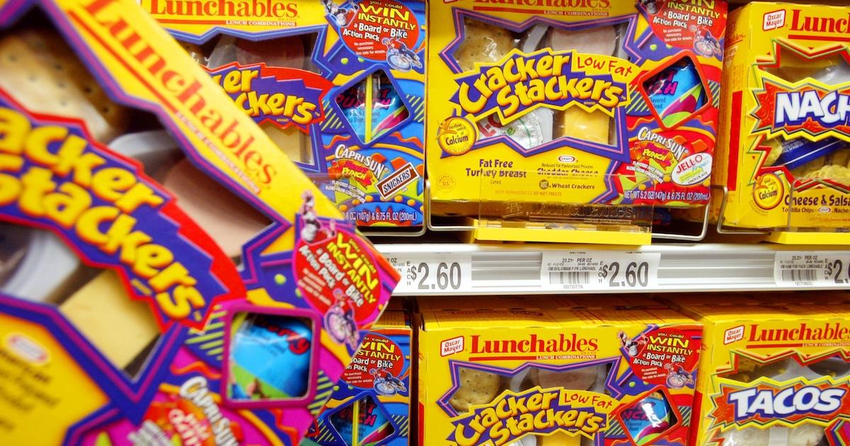 A shopper picks an Oscar Mayer Lunchables product from a store shelf July 1, 2003 in Miami, Fla.