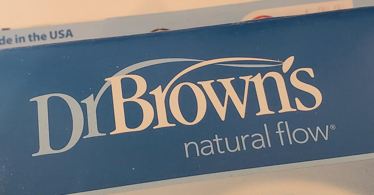 Close-up shot of the packaging for Dr. Brown's Natural Flow baby product with the company logo visible.