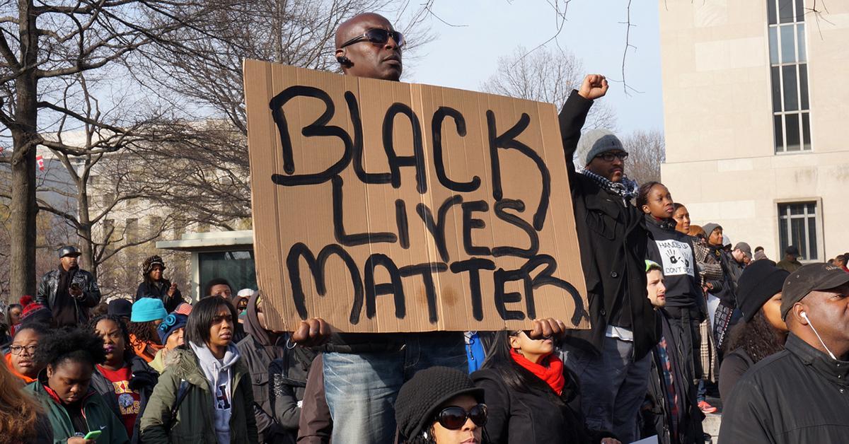 black lives matter protest sign green