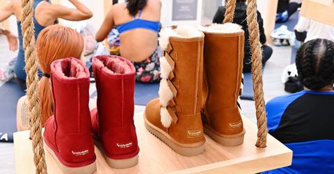 Vegan UGG boot alternatives on a swing in a shop