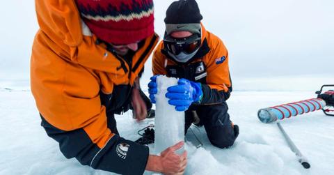 Scientists drilling an ice core from the thick Antarctic Ice sheet (Representative Cover Image Source: Getty Images | Jason Edwards)