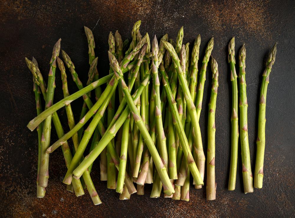 Asparagus on a wooden table.