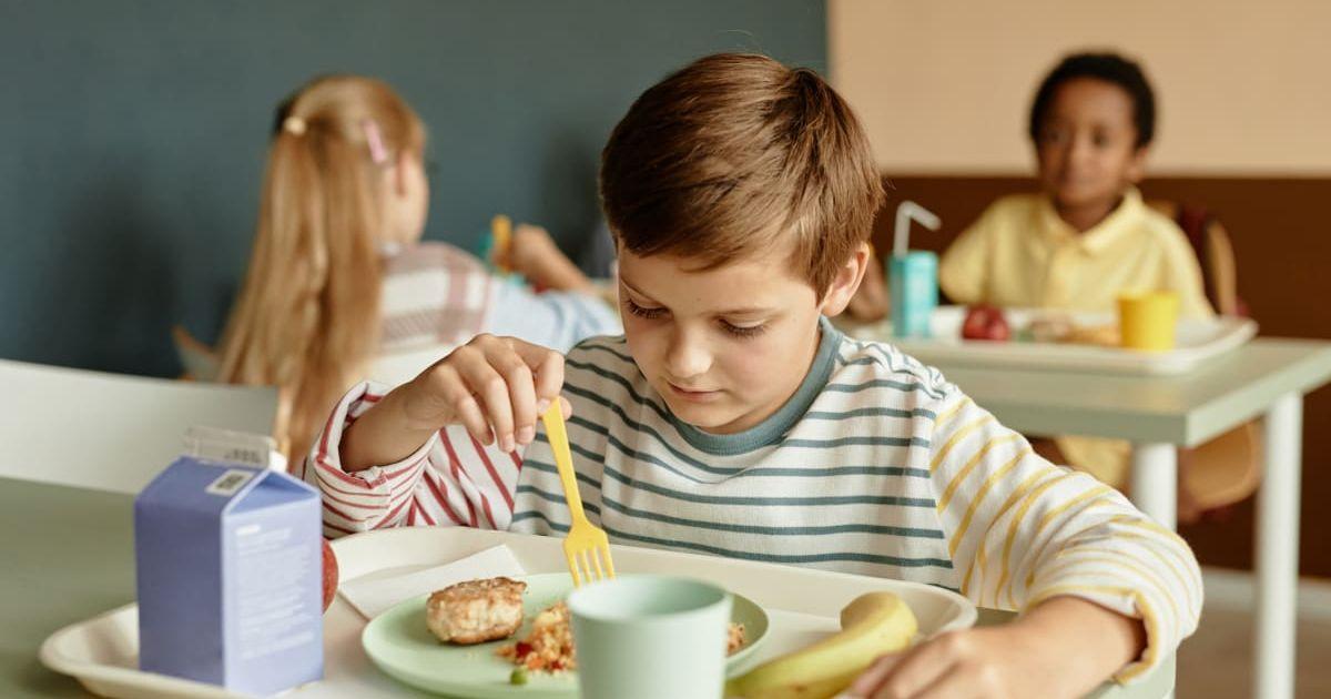 Students enjoying delicious meals in their school lunchroom (Representative Cover Image Source: Getty Images | Seventy Four)