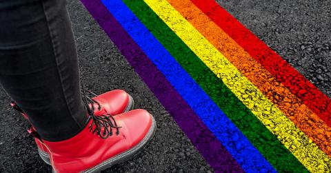 Rainbow pavement and red shoes.