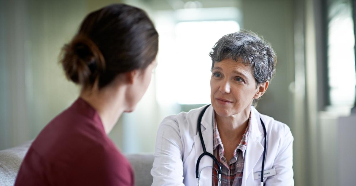 Woman speaking with her doctor. 