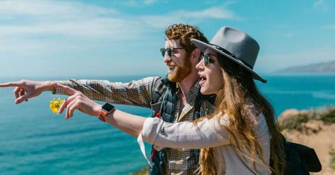 Couple at the beach watching the ocean waves (Representative Cover Image Source: Pexels | RDNE Stock Project)