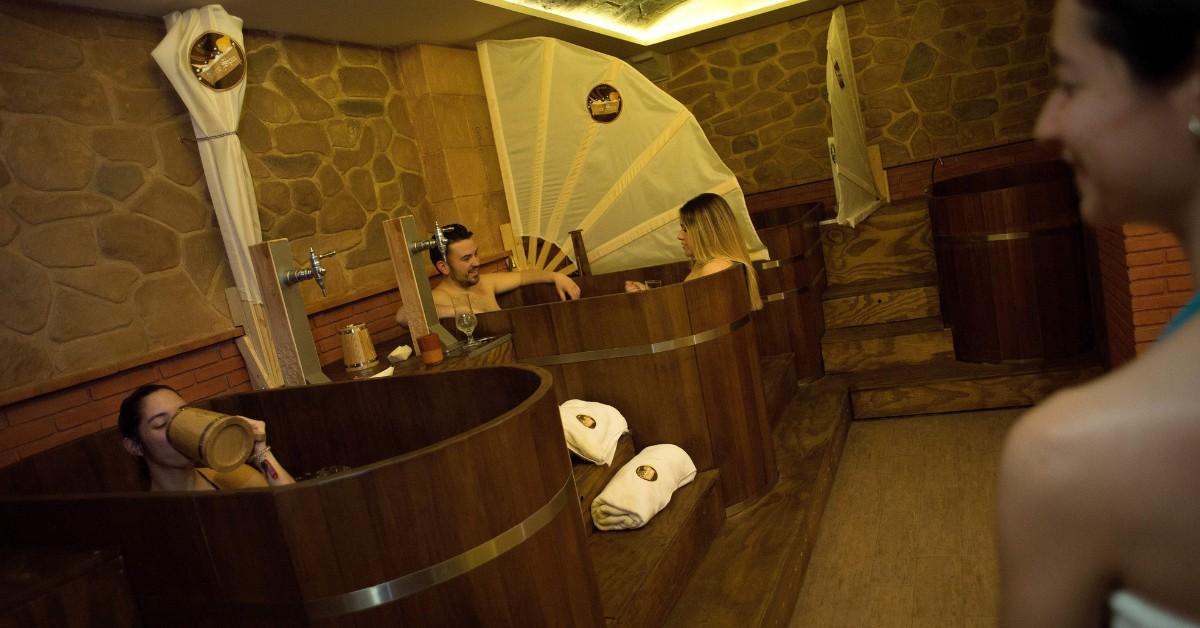 People bathing at the Beer Spa of Spain in Granada